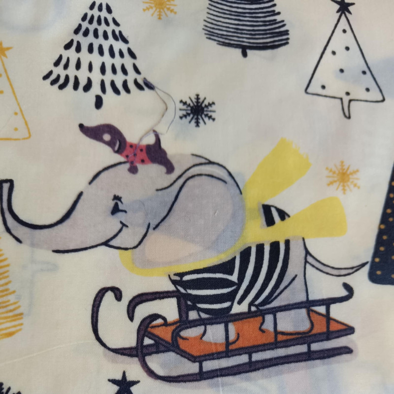 Bičių vaško drobelė „Drambliukai ant rogių“ rudo kartono pakuotėje